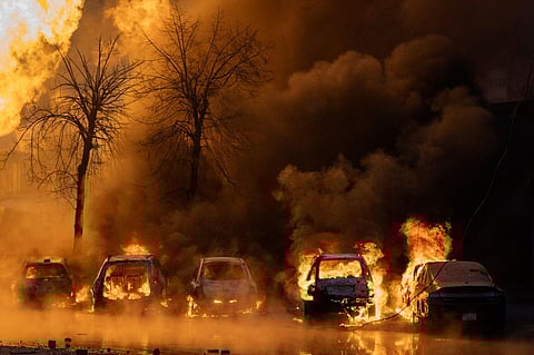 Cars burn after a Russian attack in Kyiv, Ukraine, Tuesday, Jan. 2, 2024. (Photo| AP)