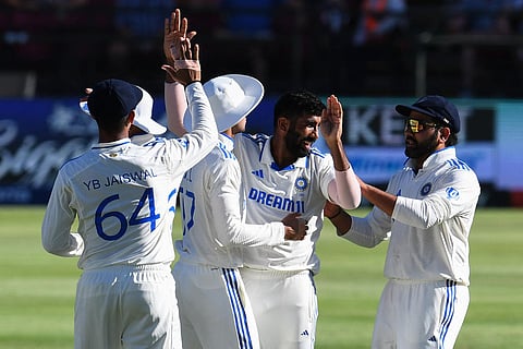 Jasprit Bumrah celebrates with teammates during the second Test between South Africa and India at Cape Town (Photo | AFP)