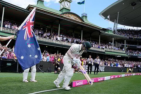 Australia's David Warner takes to the field to bat in his final test before retiring, on the fourth day of their cricket test match against Pakistan in Sydney, Saturday, Jan. 6, 2024. (Photo | PTI)