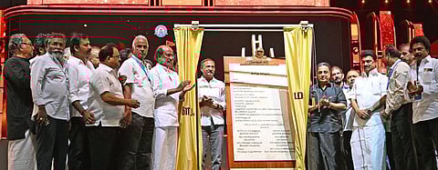 MK Stalin unveils a tribute for M Karunanidhi, penned by Tamil Nadu Film Producer’s Council, at an event in Guindy on Saturday | Express