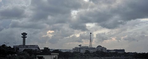 Dark clouds loom over Cooum at Napier bridge in Chennai. (Photo | P Jawahar, EPS)