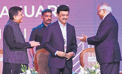 TVS group chief Venu Srinivasan greets Chief Minister M K Stalin at the Global Investors Meet. Union Commerce Minister Piyush Goyal is also seen. (Photo | Ashwin Prasath, EPS)