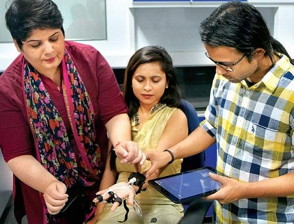 Rajlakshmi (left) and her team members using TJay