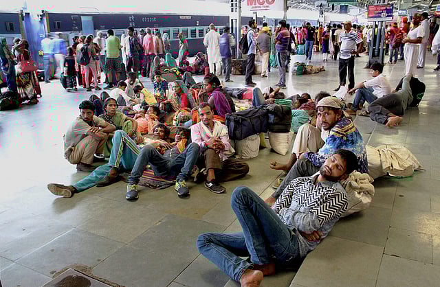 Stranded passengers at a railway station in Jammu after several trains were cancelled in view of the Dera chief rape case verdict. (PTI)