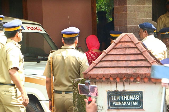 Jollyamma being taken to the house of deceased Roy Thomas for collecting evidence at Koodathayi in Thamarassery. ( Photo | TP Sooraj )