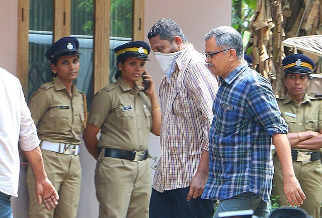 Police taking second accused MS Mathew to the house of deceased Roy Thomas for collecting evidence at Koodathayi near Thamarassery in Kozhikode. ( Photo | TP Sooraj )
