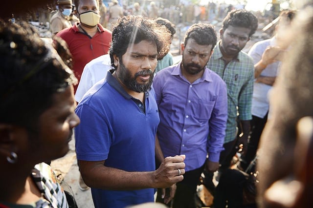 Film director Pa Ranjith talking to the officials regarding the allocation of houses to the residents. (Photo | Debadatta Mallick, EPS)
