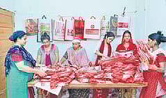 Kudumbashree workers engaged in cloth bag production at one of the manufacturing units in the state  