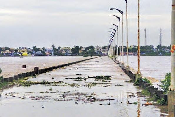 Munneru rivulet flowing over a bridge at Penuganchiprolu in Krishna district