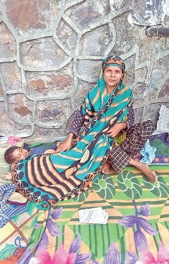 Ishrat with her newborn baby | Express