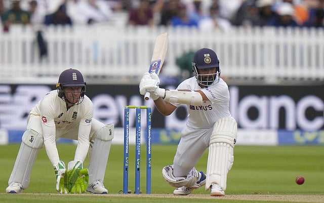 India's Ajinkya Rahane hits England's Moeen Ali for 4 runs during the fourth day. (Photo | AP)