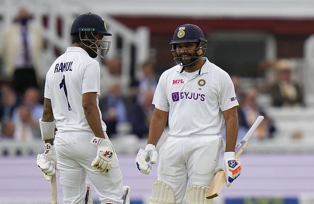 India's Rohit Sharma, right smiles as he talks to teammate India's KL Rahul after taking 4 runs off the bowling off England's Sam Curran. (Photo | AP)
