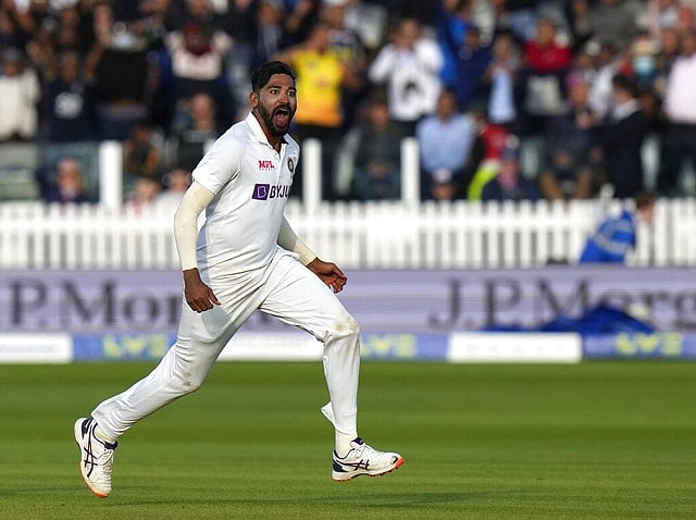 India's Mdohammed Siraj celebrates after taking the wicket of England's Jos Buttler during the fifth day. (Photo | AP)