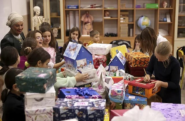 Bosnian children prepare presents for Ukrainian children at Safvet Beg Basagic elementary school in Sarajevo, Bosnia. (Photo | AP)