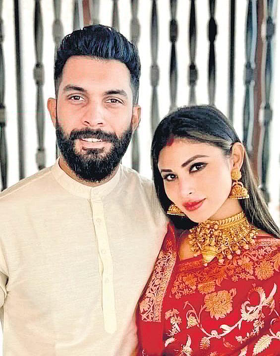 Suraj Nambiar and Mouni Roy