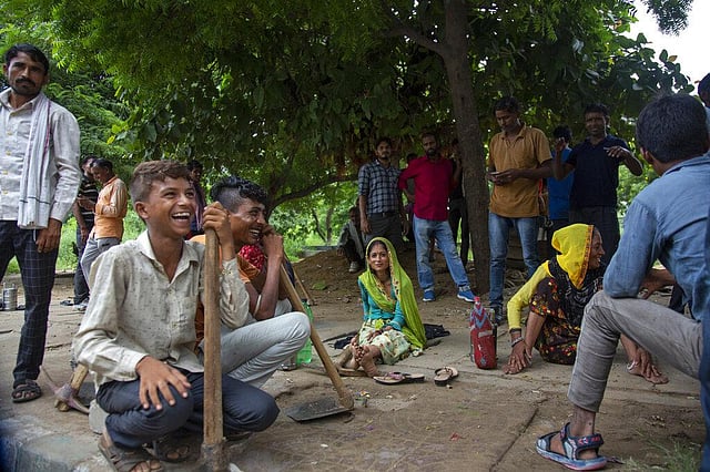 People from India's northern states wait at labor chowk - a bazaar at the junction of four roads where hundreds of workers gather daily at daybreak to plead for work in Manesar Industrial Area, Haryana. (Photo | AP)