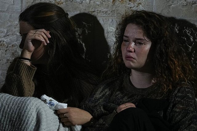 Mourners react during funeral of Israeli couple, victims of a shooting attack in east Jerusalem (Photo | AP)