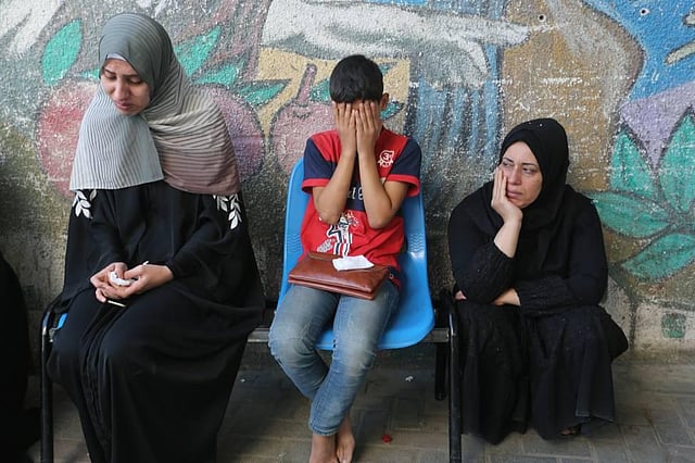 Palestinians mourn relatives killed in the Israeli bombardment of the Gaza Strip | AP