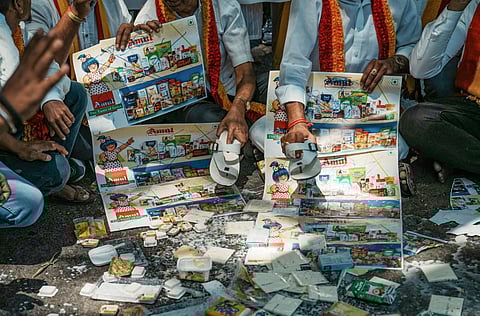 Members of pro-Kannada organisation 'Kannada Rakshana Vedike' stage a protest amid reports claiming the entry of Amul products in Karnataka market, in Bengaluru, on April 10, 2023.