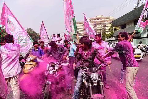 TRS party workers paint the town pink in Hyderabad as TRS heads for a massive win in the Telangana assembly election. (Photo | Vinay Madapu/ EPS)