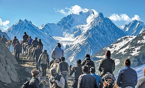 Devotees on their way to the holy cave shrine of Amarnath, in Baltal, Jammu and Kashmir.