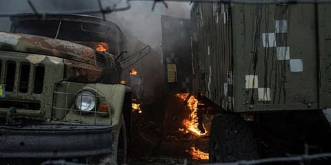 Ukrainian military truck burns at an air defence base in the aftermath of an Russian strike in Mariupol, Ukraine. (Photo | AP)