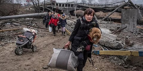 Social workers brought 30 bodies wrapped in carpets or bags Wednesday, and 40 were brought Tuesday. (Photo | AP)