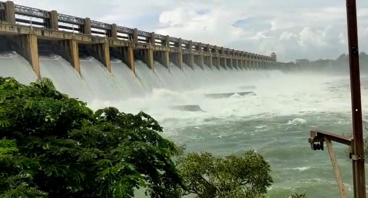 Krishna river in full spate as seven gates of Srisailam dam in ...