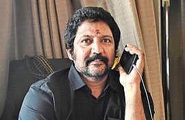 Vamsi in US, aide held for attack on TDP office