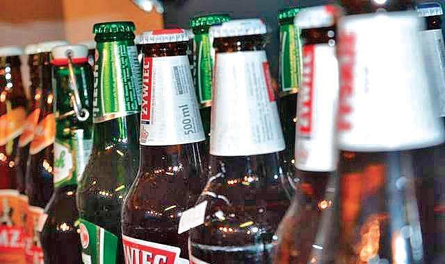 Angry over lack of chilled beer, tipplers damage liquor store, attack owner
