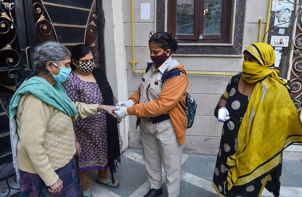 Experts see building of a second Covid wave in India as mortality rate ...