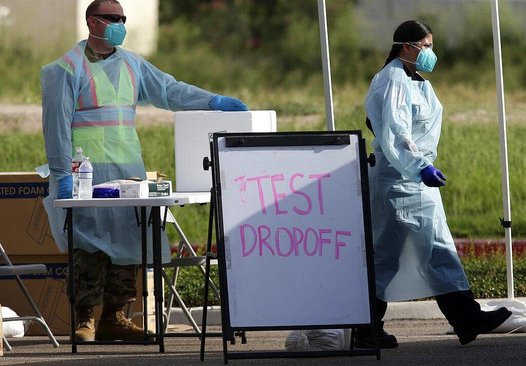 'Hot mess': Americans face testing delays as COVID-19 cases cross three ...
