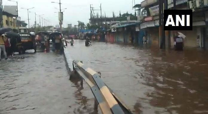 400 vehicles submerged in flooded parking lot in Mumbai