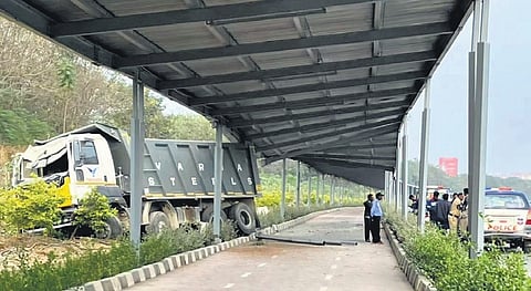 Officials inspect the damaged portion of the solar cycle track in Janawada on Monday