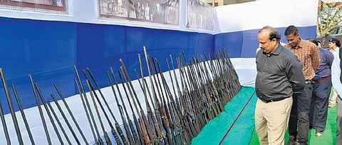 The PCCF (wildlife) inspecting firearms seized from poachers on Sunday.