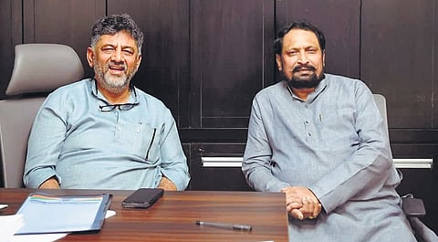 Deputy Chief Minister DK Shivakumar meets Congress MLA Laxman Savadi in Bengaluru on Thursday.