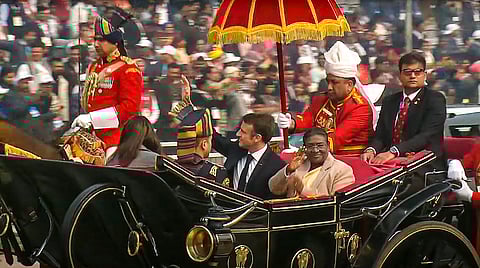 President Droupadi Murmu and French President Emmanuel Macron riding in a special presidential carriage arrives at the Kartavya Path for the 75th Republic Day celebrations, in New Delhi, Friday, Jan. 26, 2024.