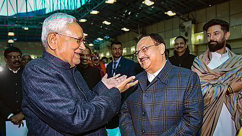 BJP National President JP Nadda and JD(U) leader and former Bihar CM Nitish Kumar during the swearing-in ceremony of new state government, at Raj Bhavan in Patna, Sunday, Jan. 28, 2024.