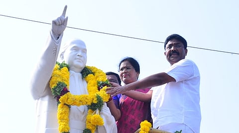 MAUD Minister A Suresh garlanding the statue of BR Ambedkar.
