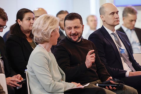 Ursula von der Leyen, president of the European Commission, left, and Volodymyr Zelenskyy, Ukraine's president, center, during the 'CEOs for Ukraine' session on the opening day of the World Economic Forum (WEF) in Davos, Switzerland, on Tuesday, Jan. 16, 2024. 