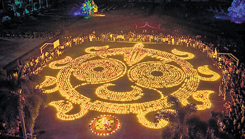 An aerial view of 30,000 diyas lit by students of a city-based residential school to create a figure of Lord Jagannath, on the occasion of Srimandir Parikrama inauguration, on Wednesday.