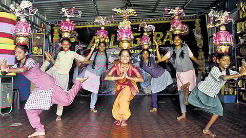 Anushapavithra teaches folk dance to government school students free of cost.
