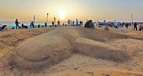 A sand art of a whale shark created by artist Vipin Vijay at the Shankhumukham beach coinciding with the Wildlife Trust of India’s campaign for the endangered species