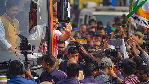Congress leader Rahul Gandhi waves at supporters during 'Bharat Jodo Nyay Yatra', in Biswanath district, Assam