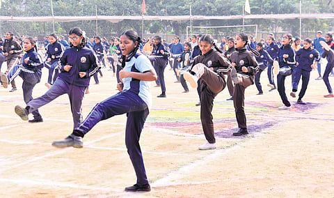 Girl students show their taekwondo skills in Nizamabad on Saturday