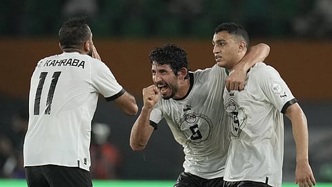 Egypt players celebrate after Mostafa Mohamed scored his side's second goal during the African Cup football match against Cape Verde, Jan 22, 2024.