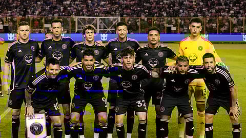 Inter Miami starting players pose for a team photo prior to a friendly football match against the El Salvador national football team.