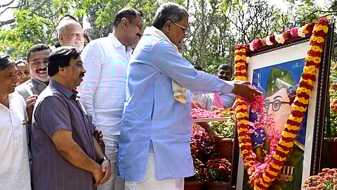 Chief Minister Siddaramaiah offers floral tributes to Netaji Subhas Chandra Bose, on his 127th birth anniversary, in Bengaluru.