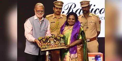 Telangana Governor Dr Tamilisai Soundararajan inaugurates the 26th Devi Awards function by lighting a lamp as TNIE CEO Lakshmi Menon, Editorial Director Prabhu Chawla and Editor Santwana Bhattacharya look on. 