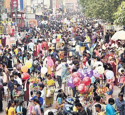 Local residents of North Chennai throng to MC Road for Pongal shopping, on Saturday.
